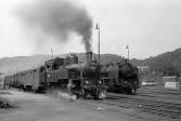 423.055 + 534.0504