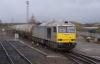 Vlak společnosti DB Schenker Rail UK v čele s lokomotivou 60099 se vrací do birminghamského intermodálního terminálu v Kingsbury, foto: mattbuck.